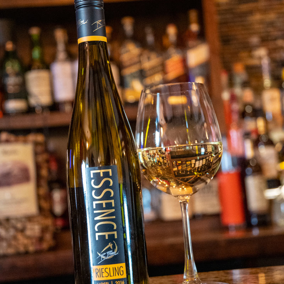 Riesling bottle and glass at the bar