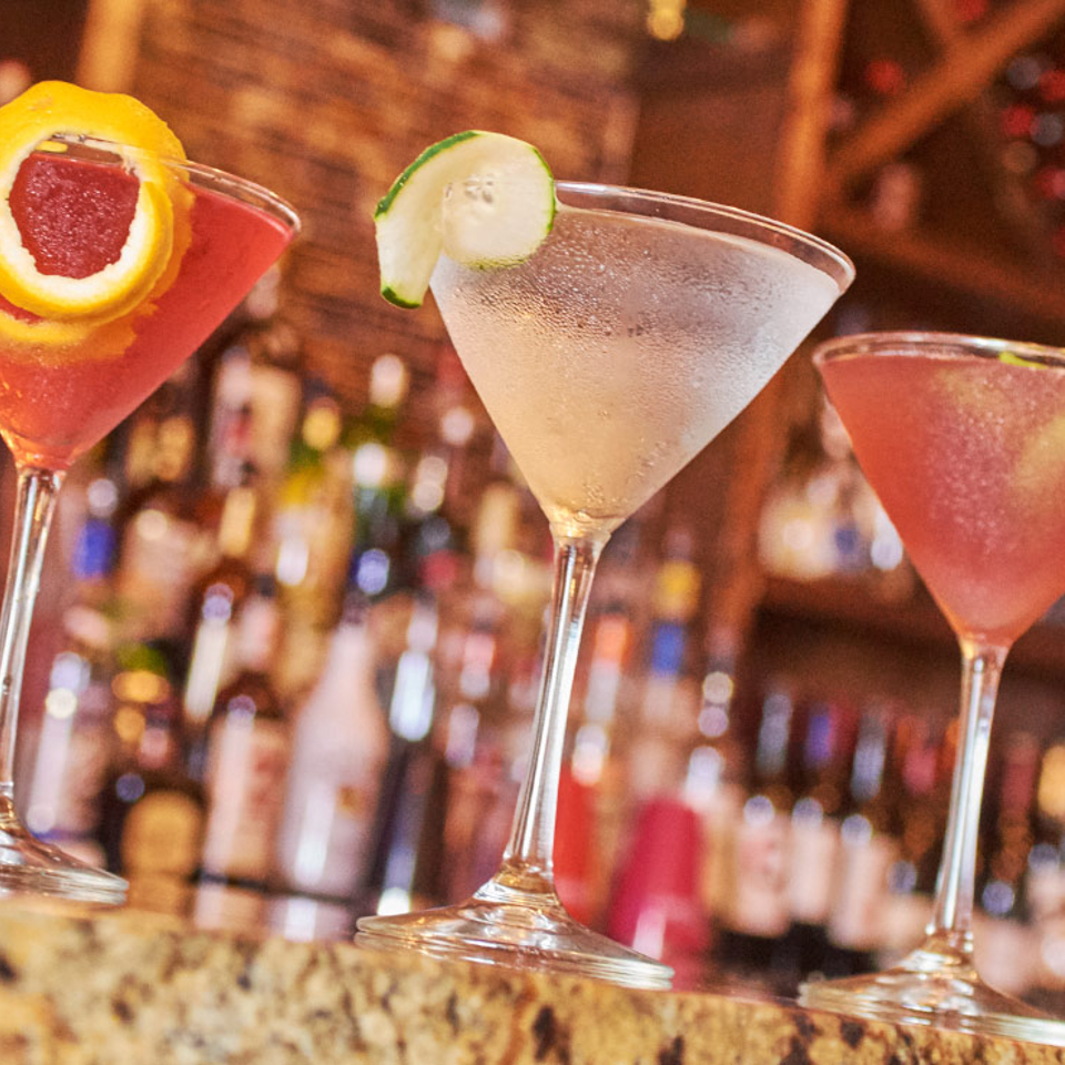 Three cocktails at the restaurant bar
