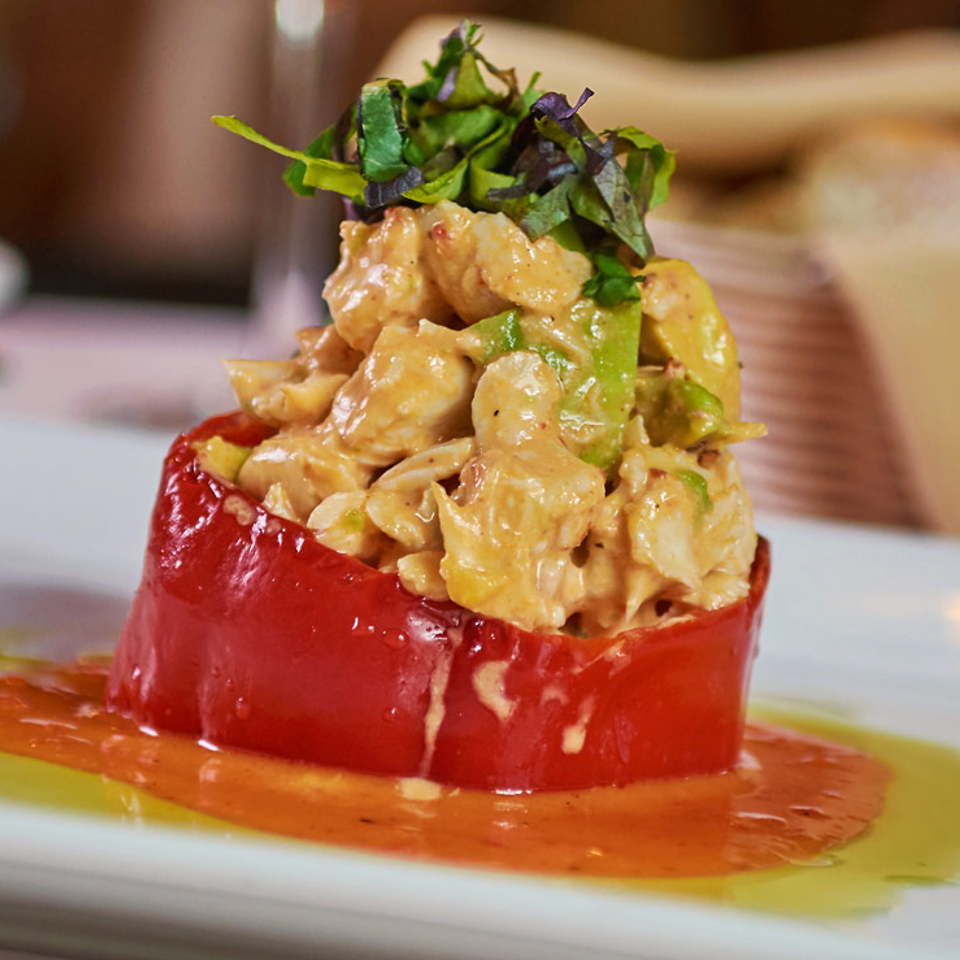 Stuffed red pepper with fresh greens