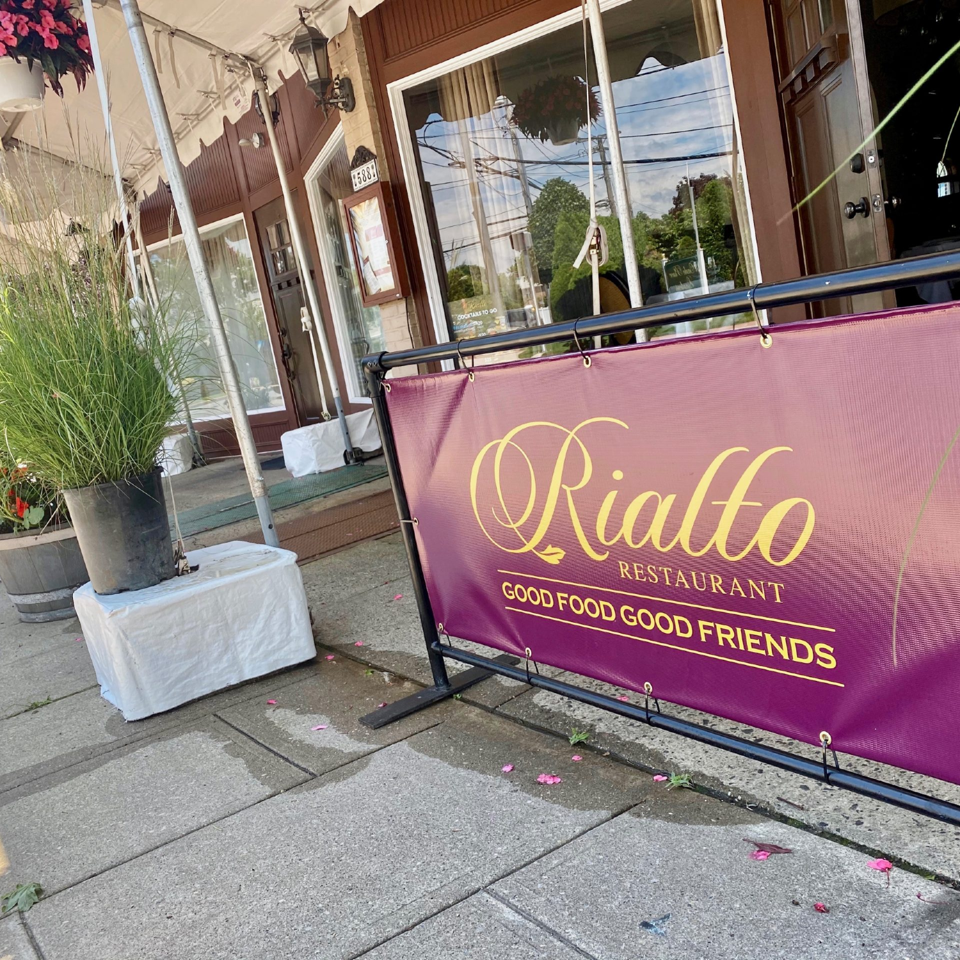Rialto restaurant entrance and outdoor banner