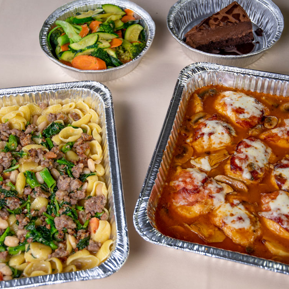 Overhead view of family meal takeout trays