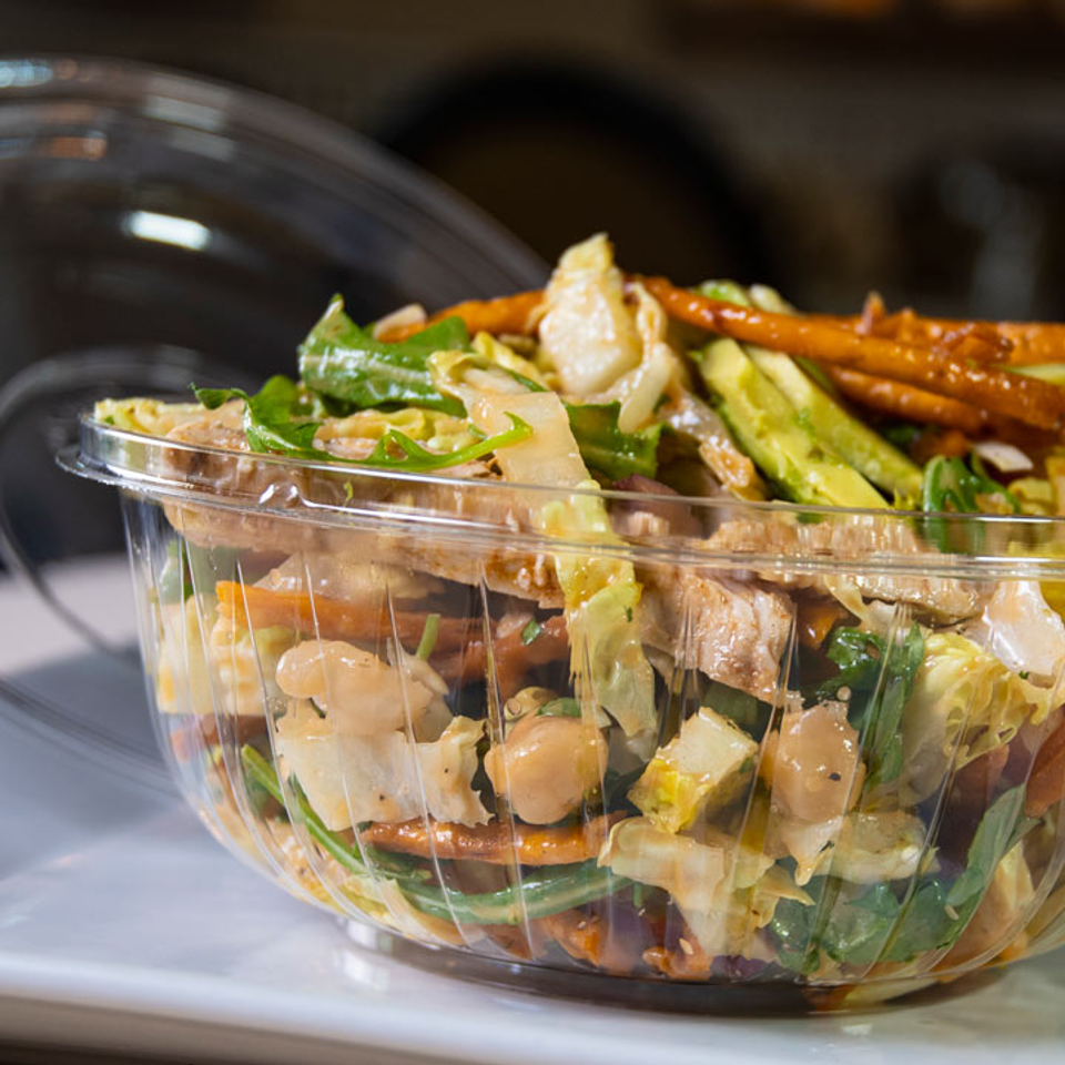 Mixed salad in a takeout container